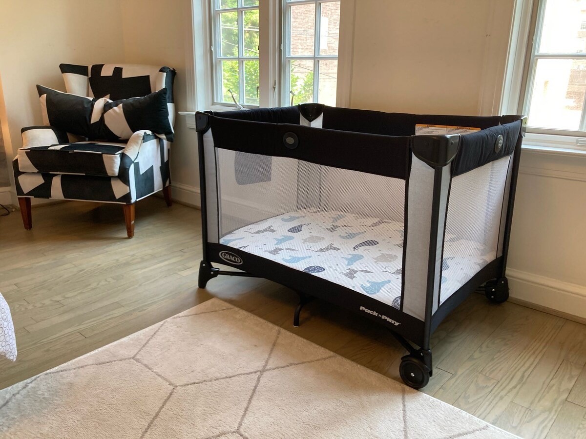Pack 'n Play set up in the Foggy Bottom home, available for families on request