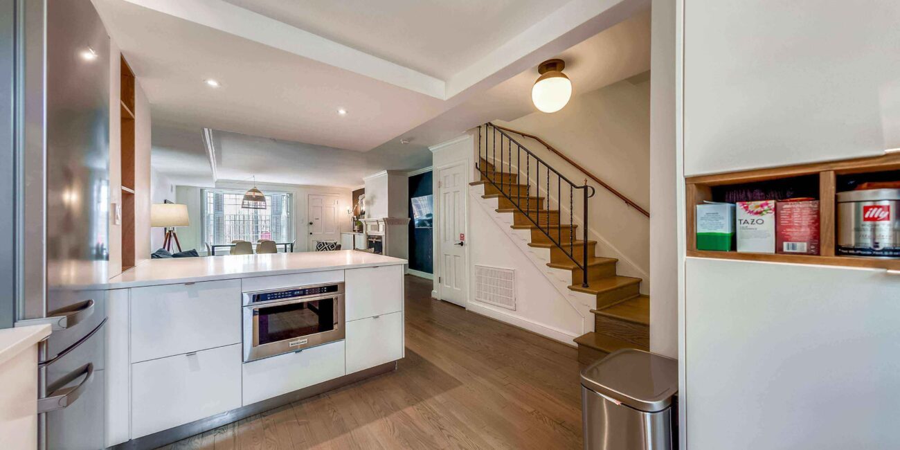 Kitchen island and stairs to the 2nd floor.